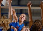 Volley--WHvsDOR-1 copy  West Henderson High School&#39;s Lindsey Pate (5), center, spikes the ball over the net against Lexington High School&#39;s Julianne Felton (3), left, and Dani Manzi (5), right, during volleyball tournament action held at Dorman High School in Spartanburg, SC, Thursday evening, 8-31-06.  Tim Kimzey/Staff Photographer Herald-Journal